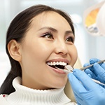 Woman at dentist for a cleaning and checkup