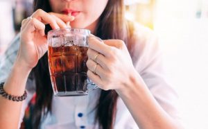 woman drinking cola