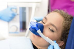 Patient using sedation dentistry in Ellington